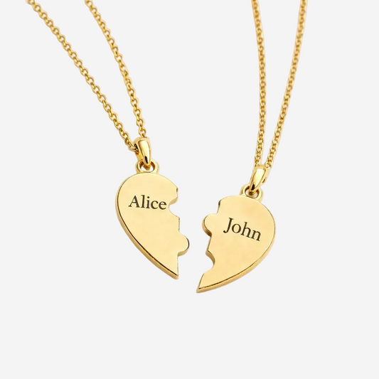 2 Engraved heart necklaces on a white background